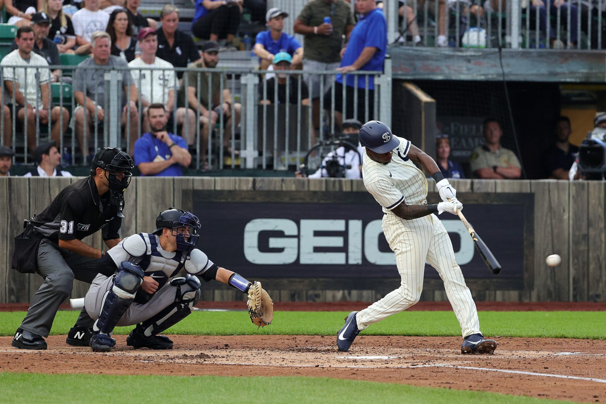 Tim Anderson hits a ball.