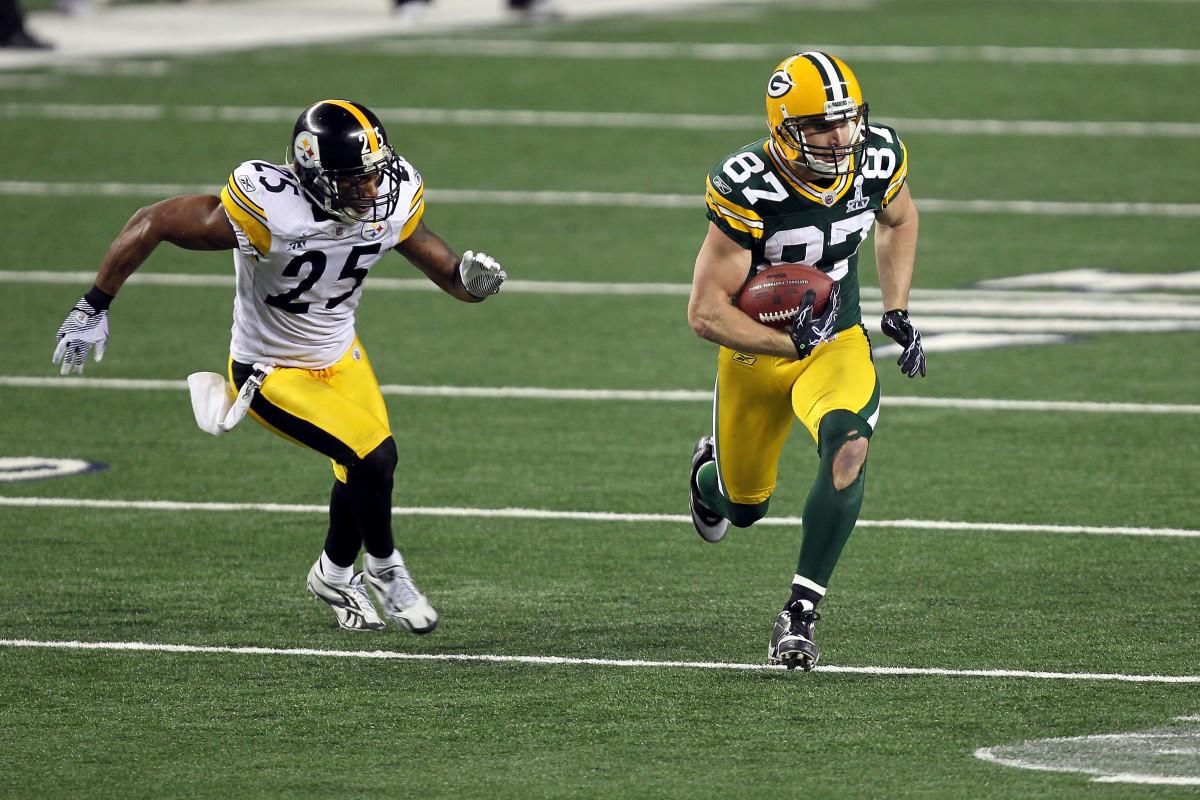 ARLINGTON, TX - FEBRUARY 06:  Jordy Nelson #87 of the Green Bay Packers runs for yards after the catch against Ryan Clark #25 of the Pittsburgh Steelers during Super Bowl XLV at Cowboys Stadium on February 6, 2011 in Arlington, Texas.  (Photo by Mike Ehrmann/Getty Images)