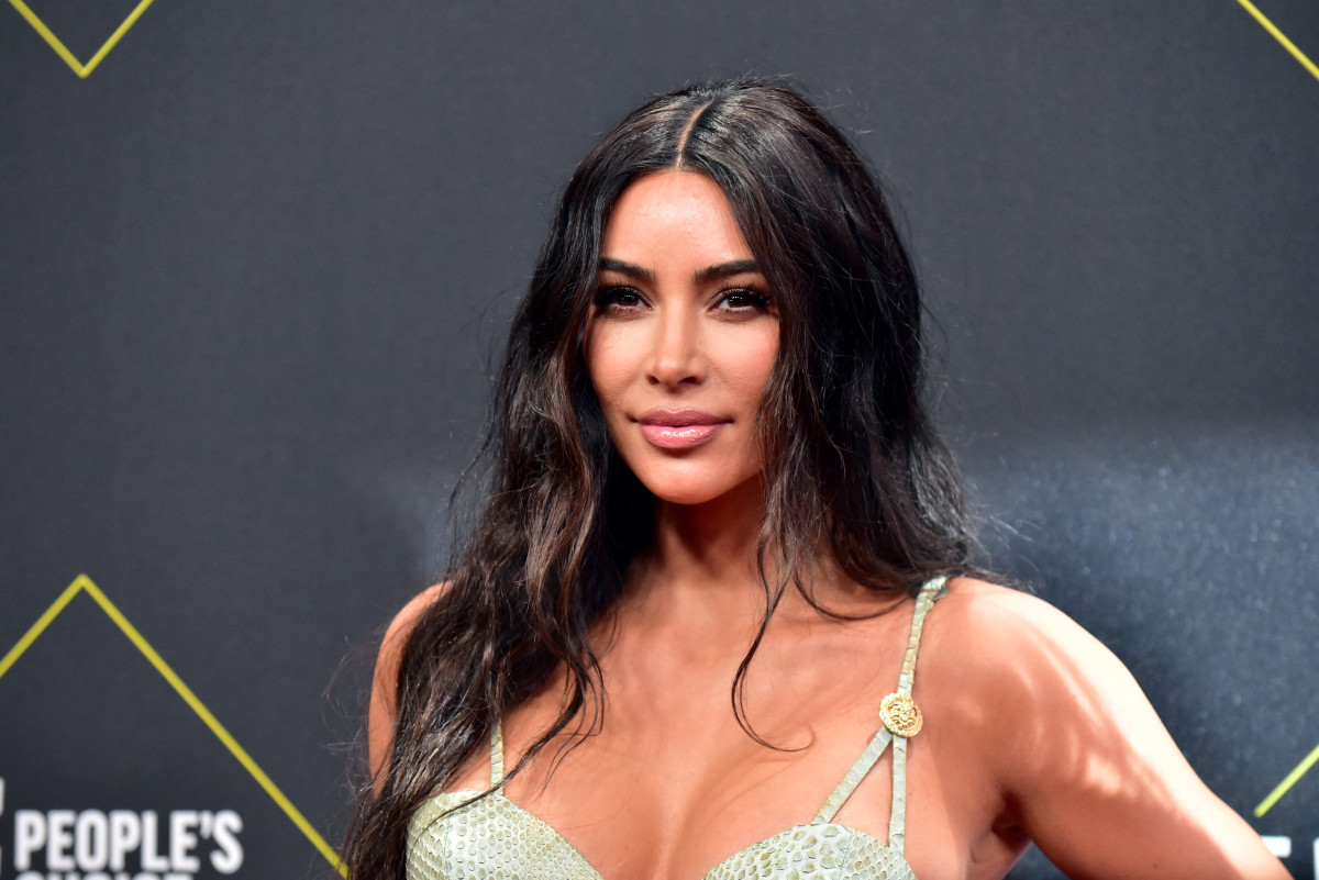 Kim Kardashian walks the red carpet at an event for the People's Choice Awards in 2019.