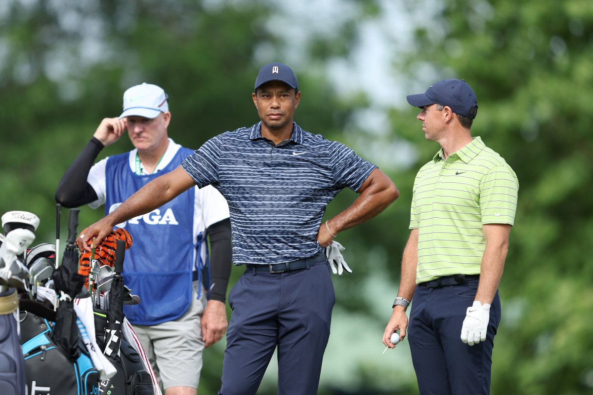 Tiger Woods alongside Rory McIlroy at the PGA Championship.