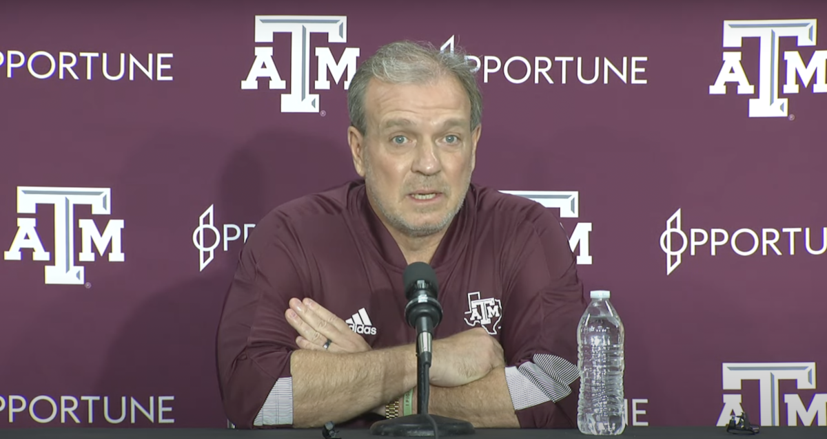 Texas A&M head football coach Jimbo Fisher at the podium on Thursday afternoon.