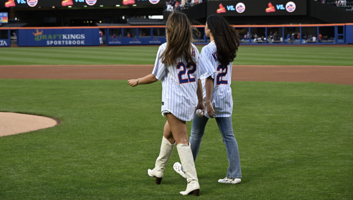 New York Mets first pitch featuring Sports Illustrated Swimsuit issue models.