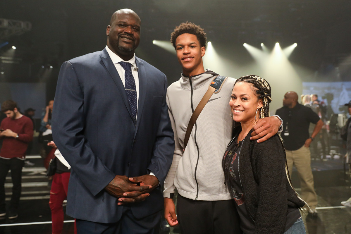 Shaunie O'Neal, the wife of legendary NBA big man Shaquille O'Neal, at an event with their son.