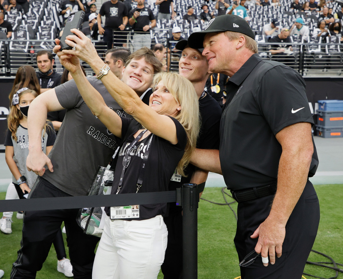 Jon Gruden and his family before a game with the Las Vegas Raiders last fall.