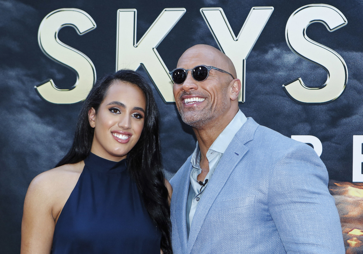 Actor Dwayne Johnson and his daughter Simone Alexandra Johnson attend the premiere of 'Skyscraper' on July 10, 2018 in New York City. (Photo by KENA BETANCUR / AFP)        (Photo credit should read KENA BETANCUR/AFP via Getty Images)