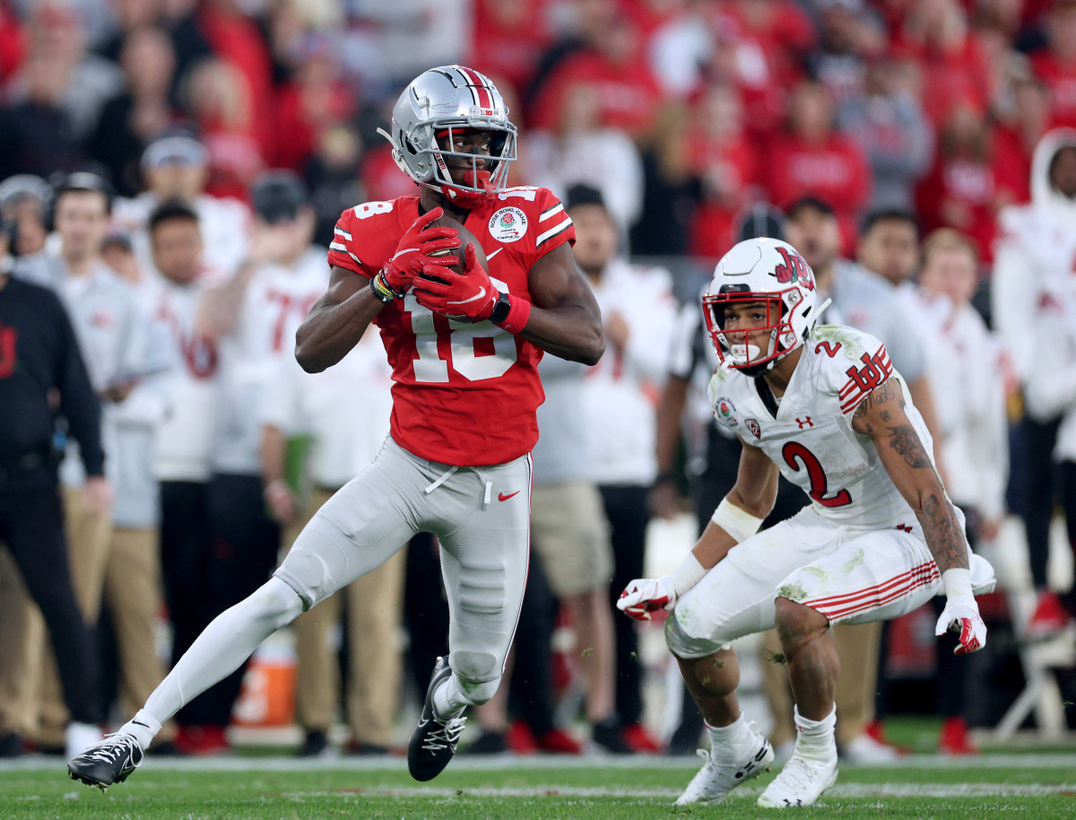 Ohio State wide receiver Marvin Harrison Jr. catches a pass against Utah in the Rose Bowl.