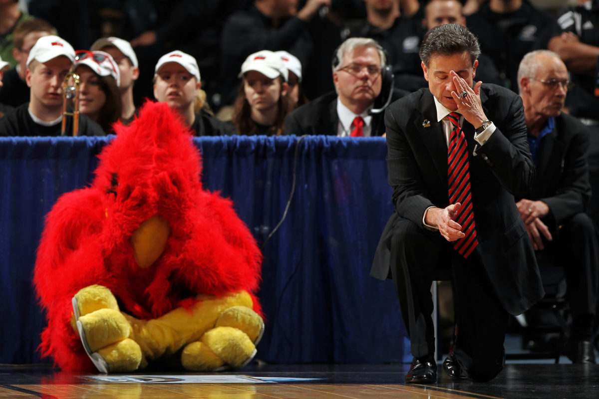 Rick Pitino upset by his team's play on the floor.