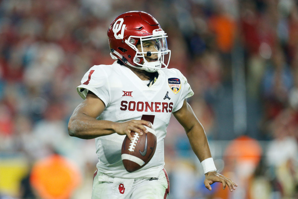 kyler murray looks to pass at the college football playoff