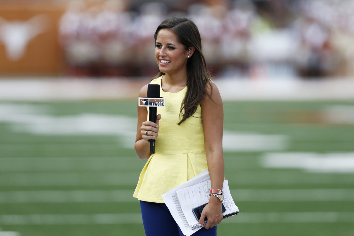 Kaylee Hartung working the sideline for ESPN at a game in Texas.