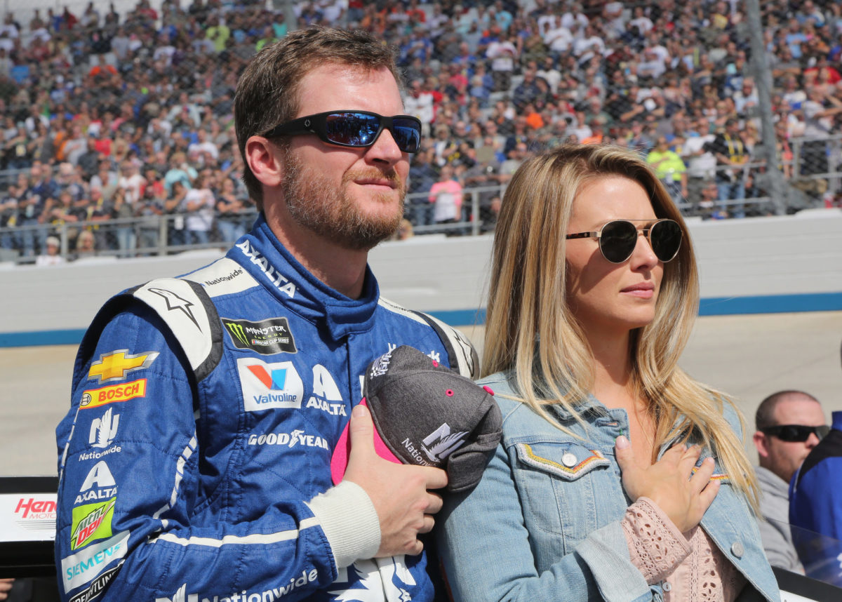 Dale Earnhardt Jr. and his wife Amy at a race.