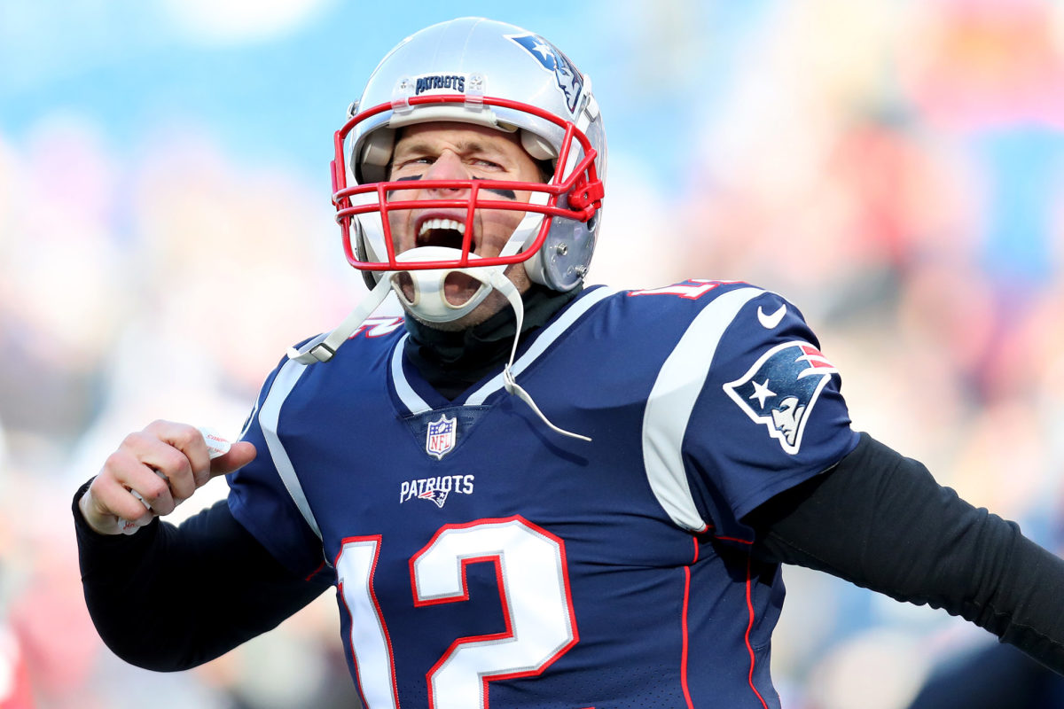 New England Patriots QB Tom Brady celebrating during a game.