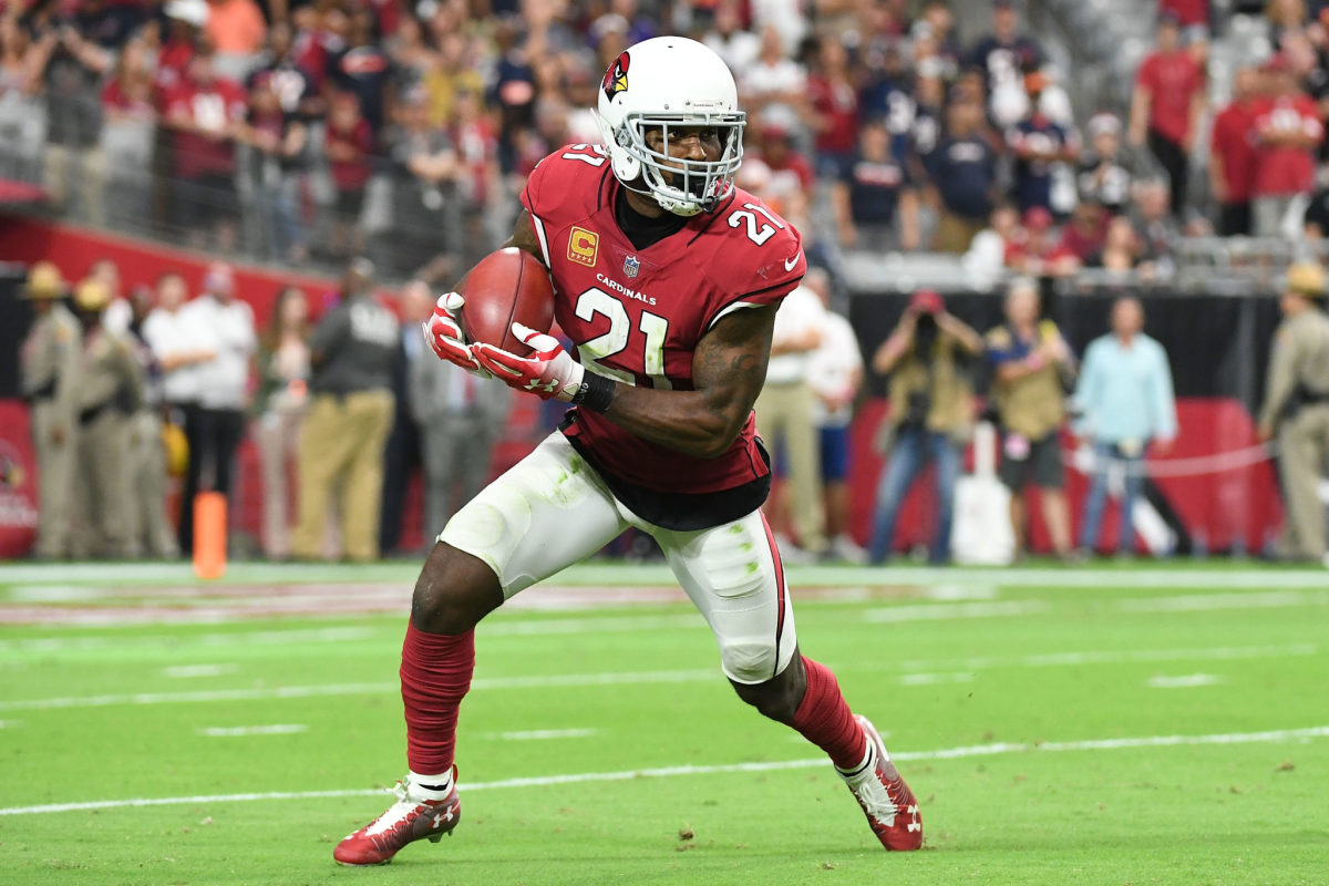 Patrick Peterson running with the ball.