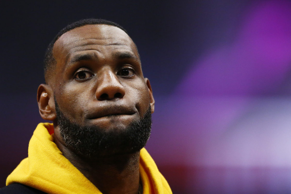 lebron james looks onto the court during an nba game