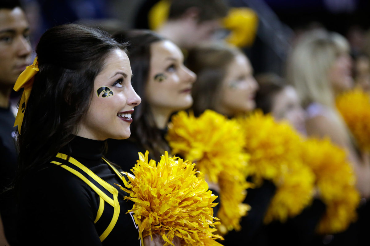 Iowa cheerleaders look on from the sideline.