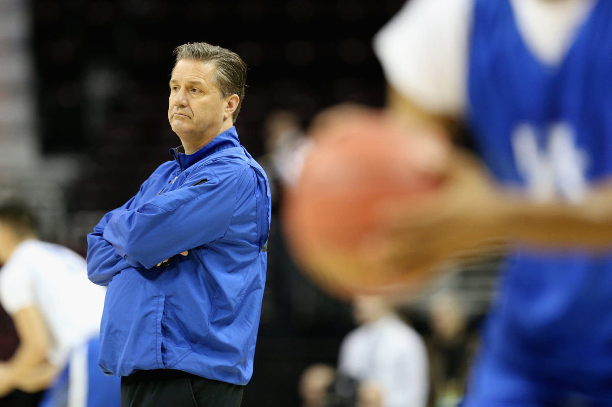 A candid picture of Coach Cal wearing Kentucky blue.