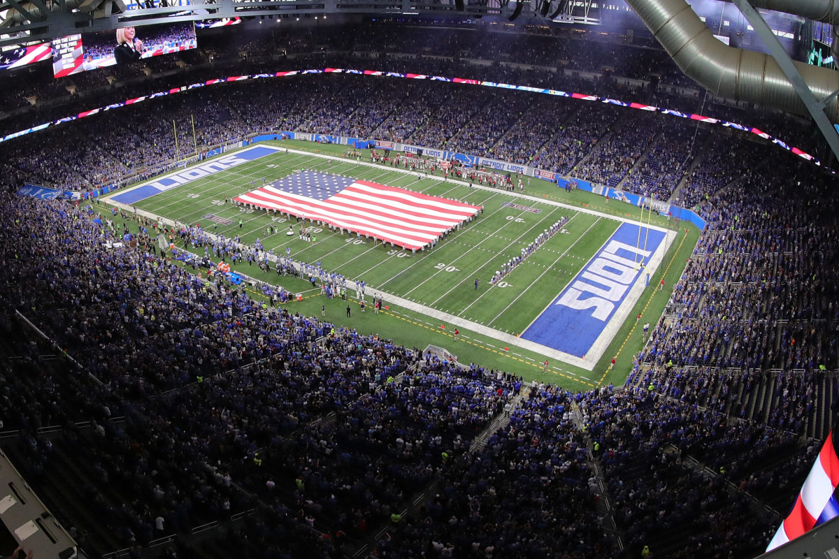 A general view of the Detroit Lions stadium with an American flag on the field.