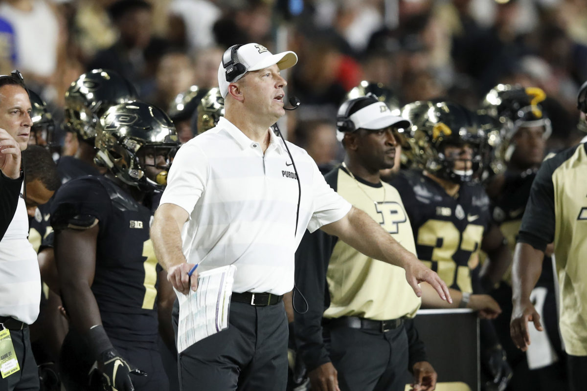 Purdue football coach Jeff Brohm on the sideline during a game.