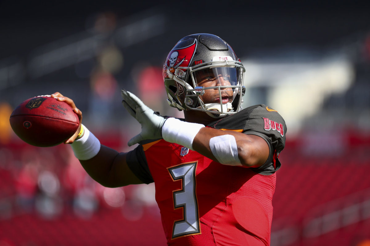 A closeup of Jameis Winston warming up before a game.