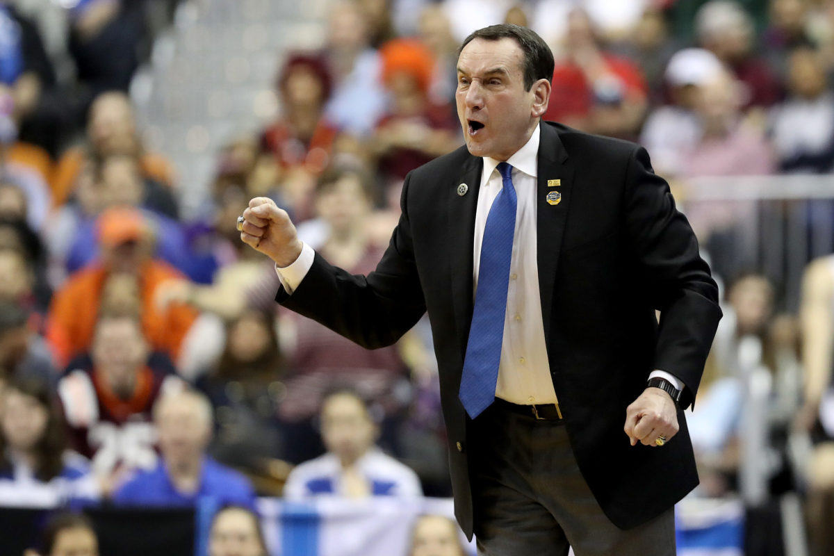 Coach K reacting to play during a Duke game.