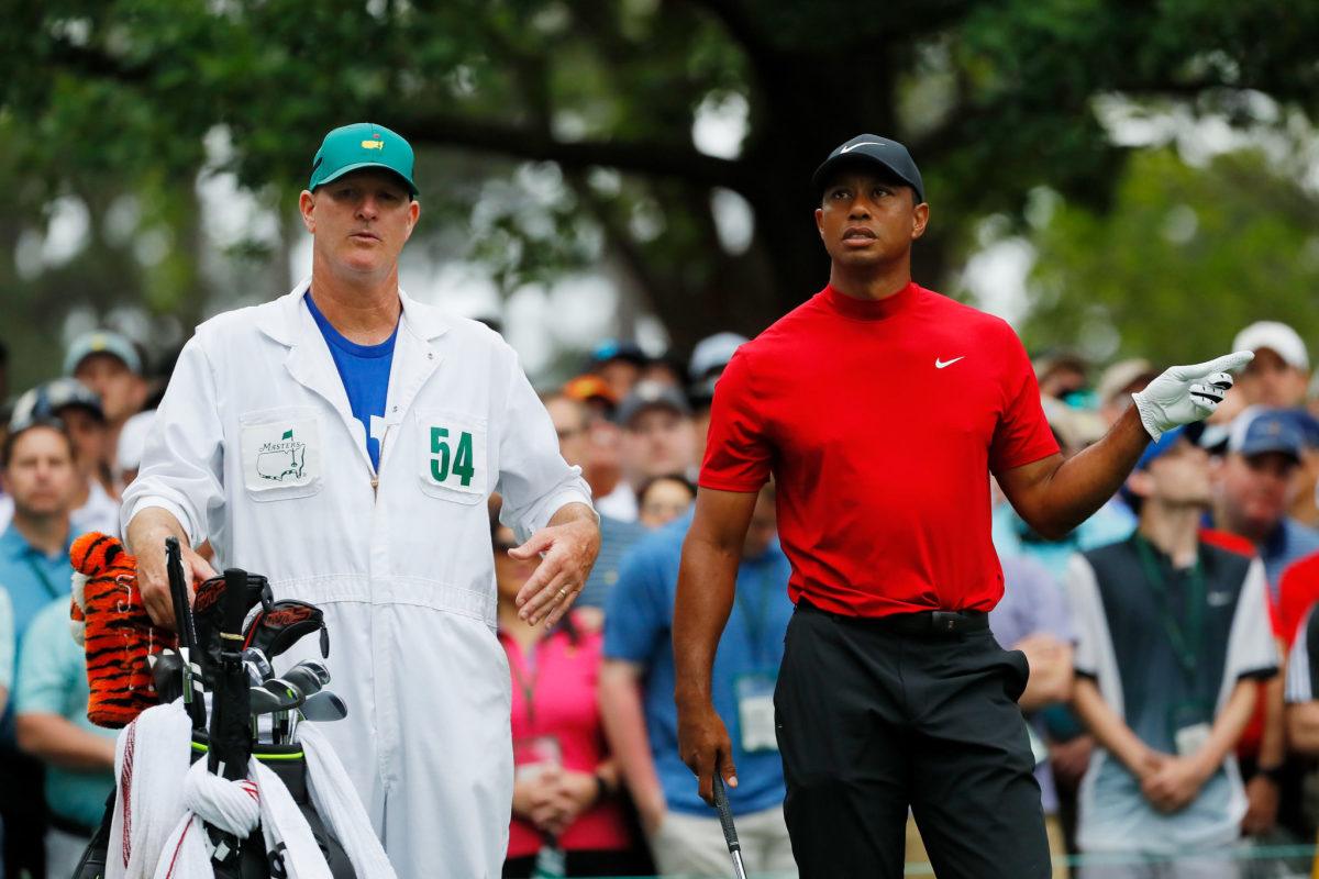 tiger woods and his caddie at the masters