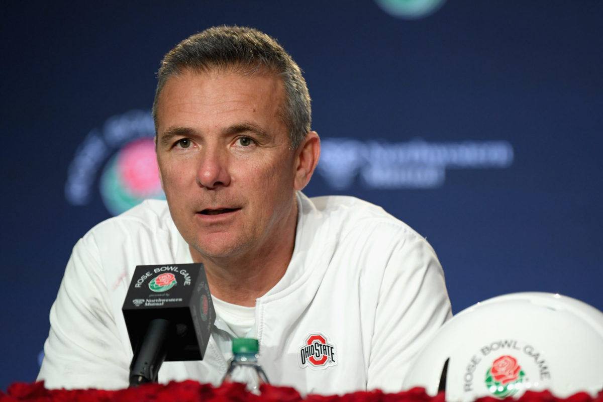 A closeup of Urban Meyer talking to the media at the Rose Bowl.