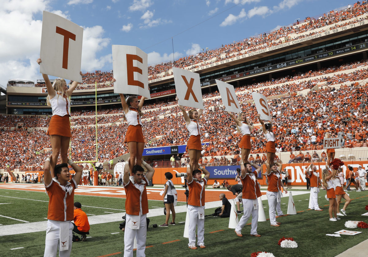 Shot of the Texas Longhorns cheerleaders performing during game.