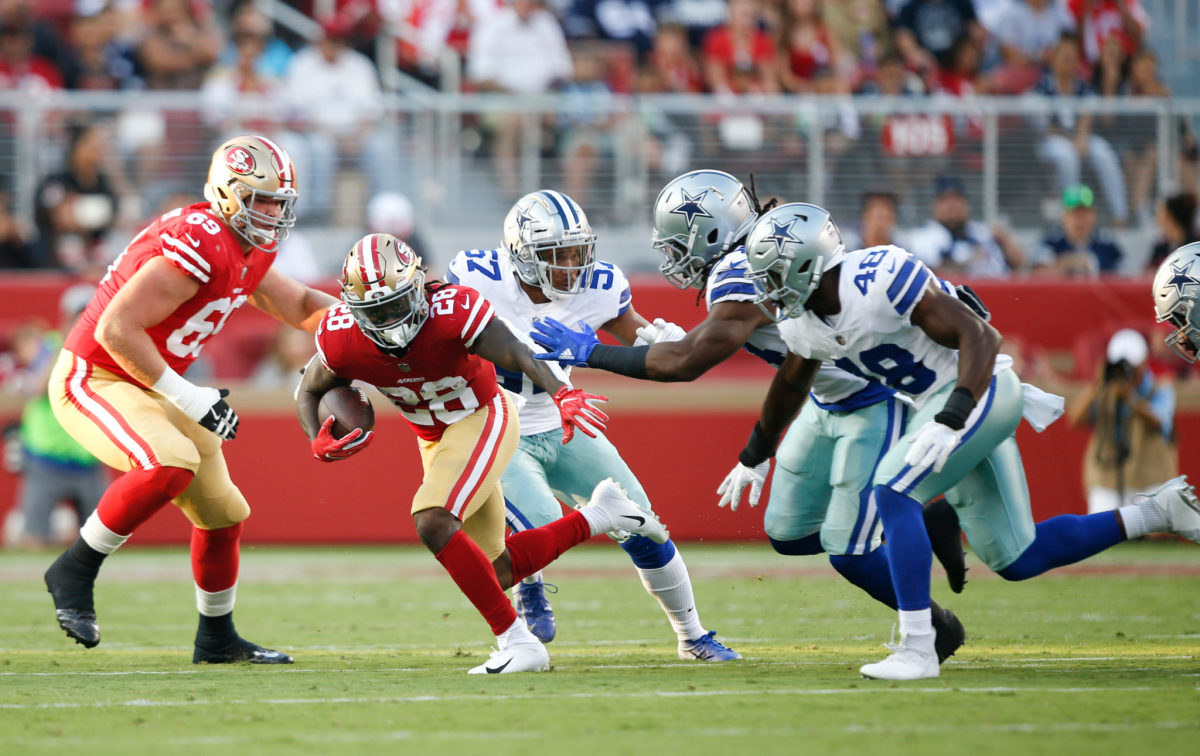 Jerick McKinnon rushes for the 49ers during a preseason game against the Cowboys.