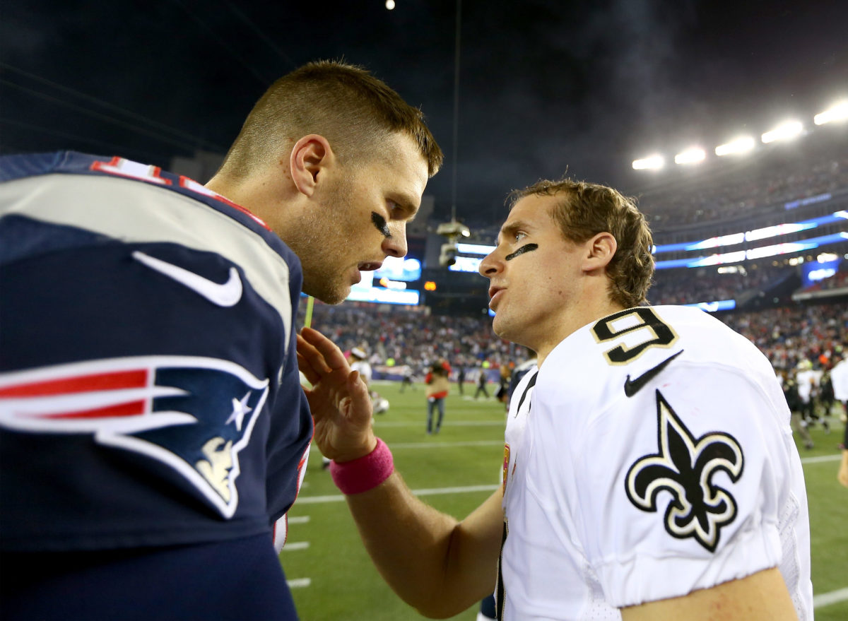 Tom Brady and Drew Brees shake hands after the game.
