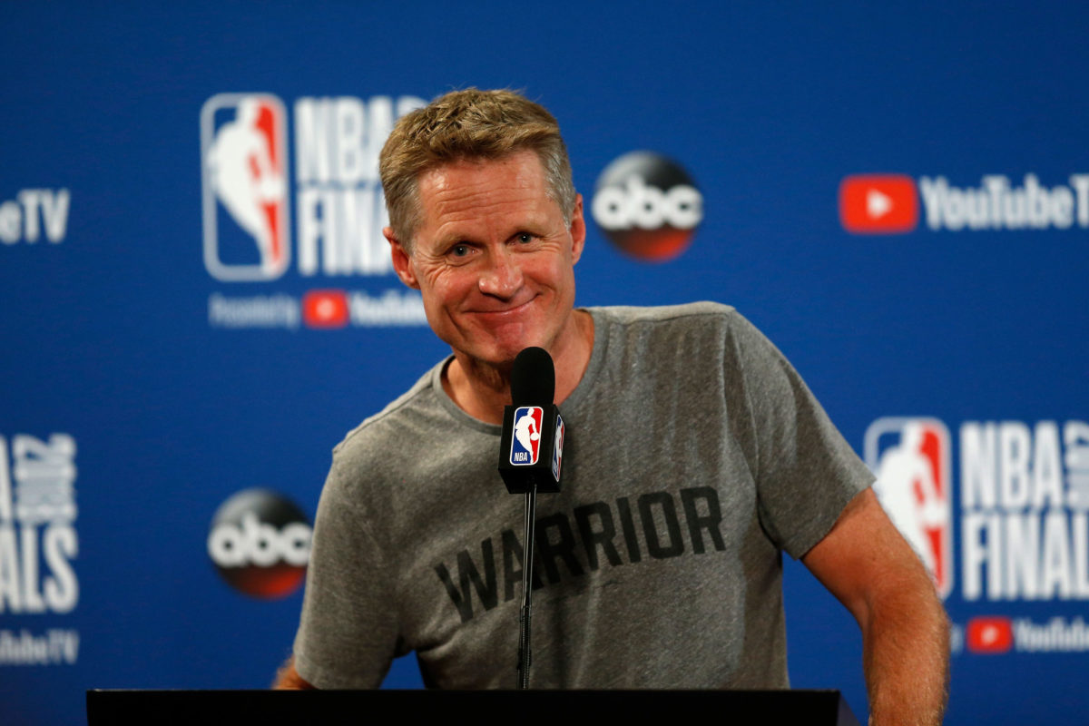 Golden State Warriors coach Steve Kerr speaking to the media.