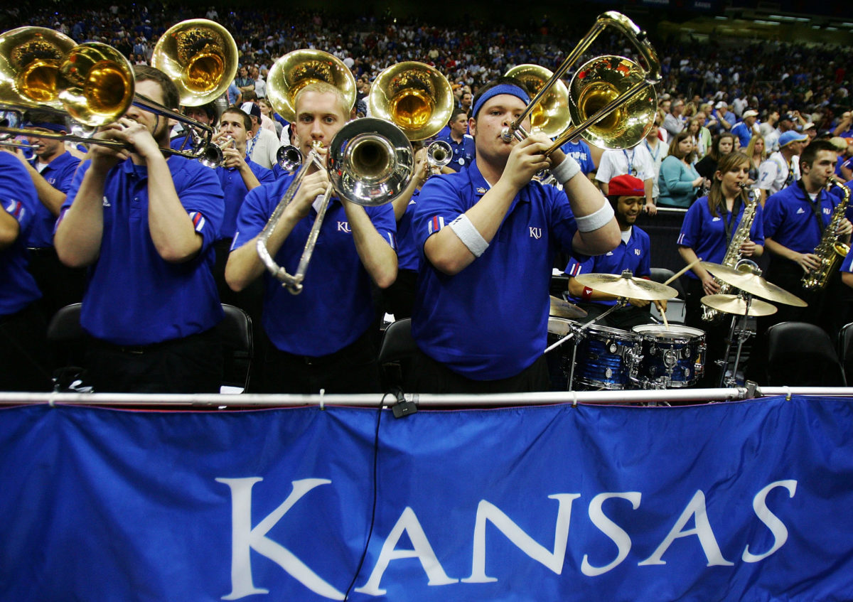 Kansas' band playing during a basketball game.