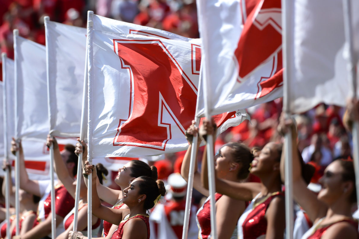 Flag members of the Nebraska Cornhuskers perform before the game against the Rutgers Scarlet Knights.