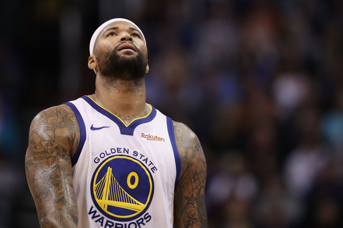 A closeup of DeMarcus Cousins looking up during a game.