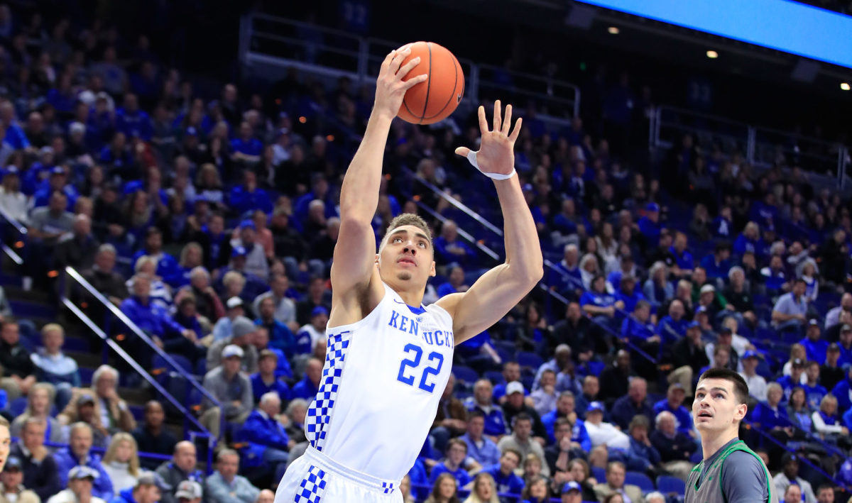 Kentucky basketball's Reid Travis goes up for layup.