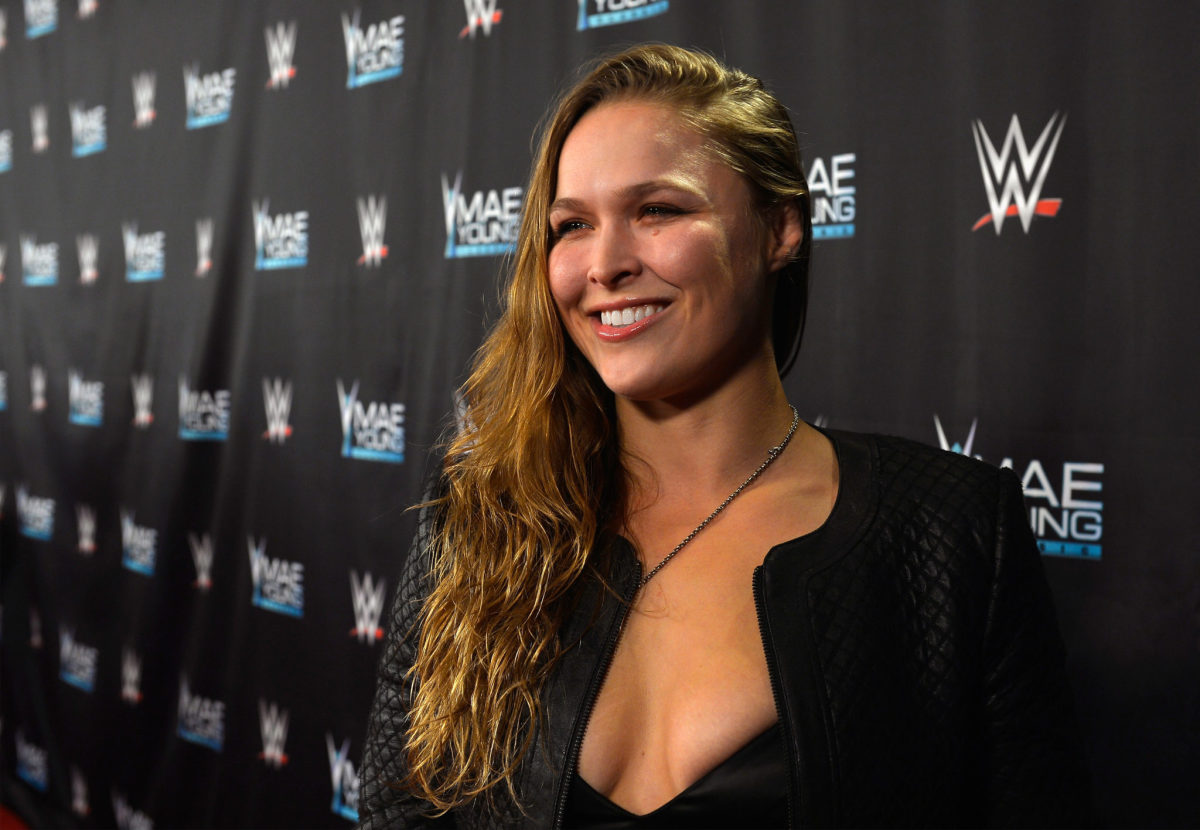 Ronda Rousey posing for a photo on the red carpet.