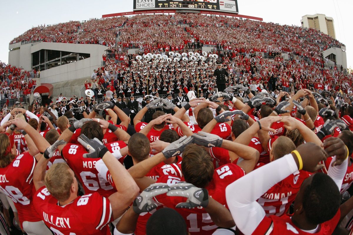 Ohio State players celebrating after a football game.