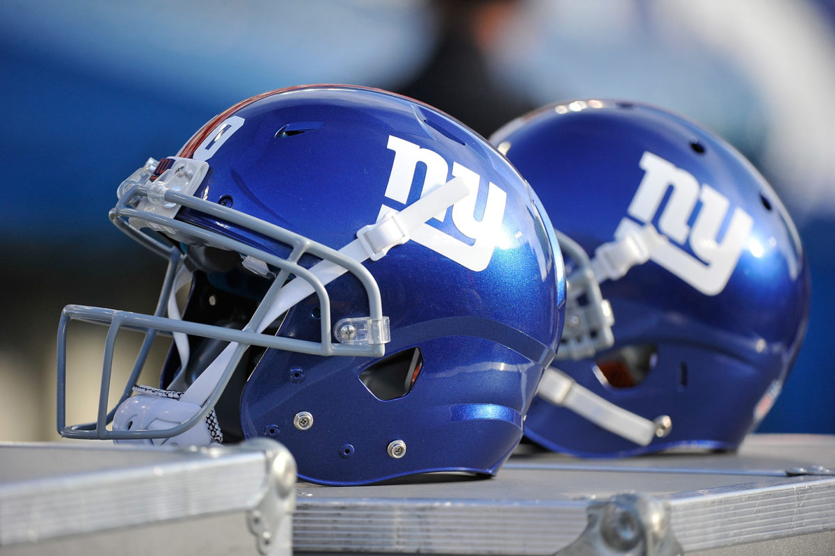 A picture of two New York Giants helmets.