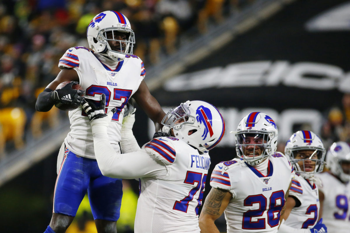 Bills players celebrate in the first half against the Steelers.