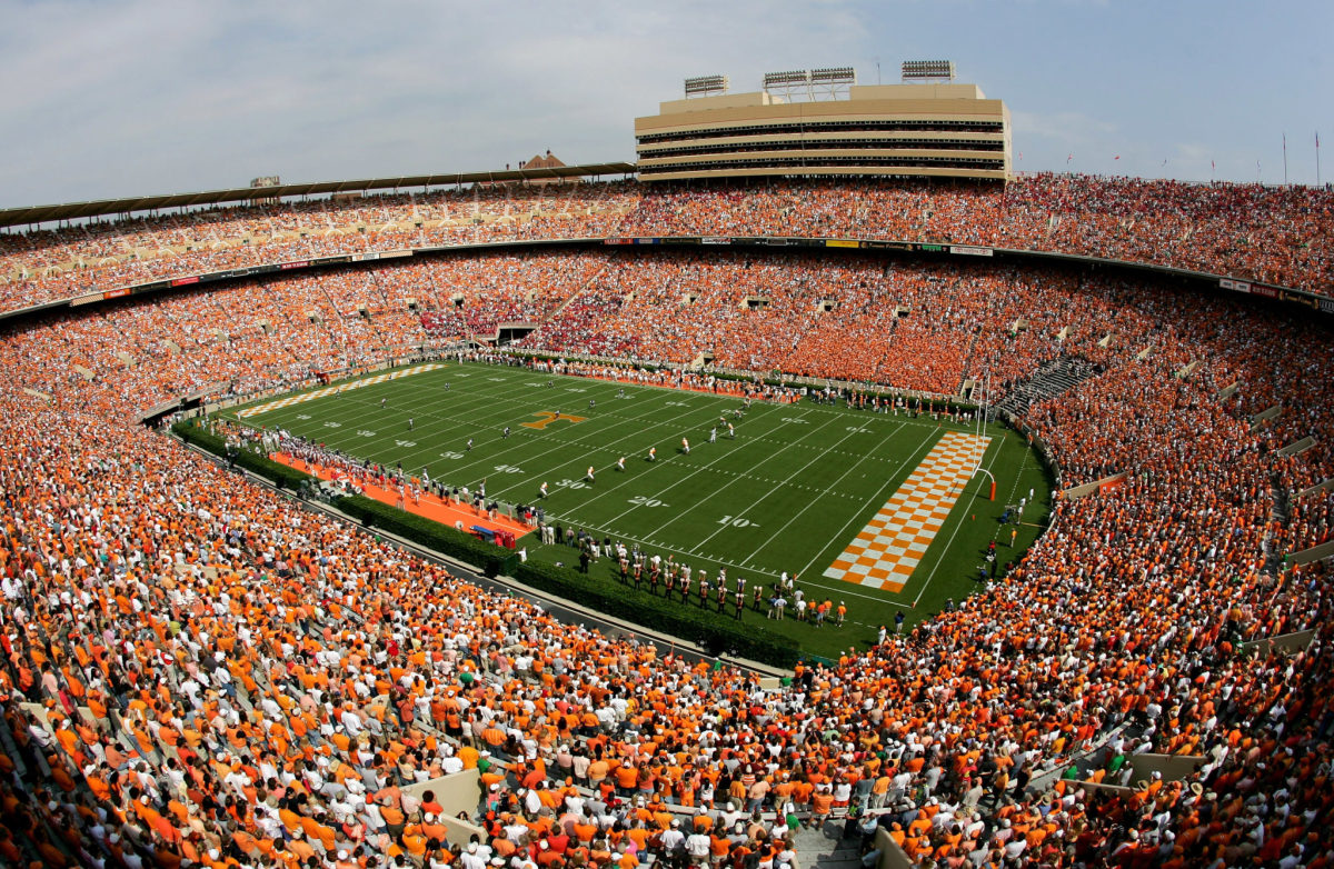 Fans pack the stands to support their teams as the Mississippi Rebels face the Tennessee Volunteers.