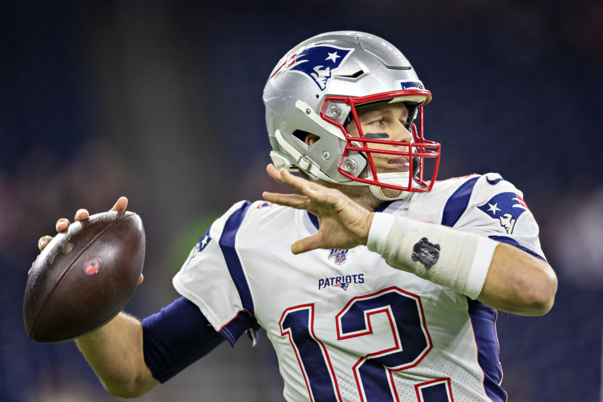 New England Patriots quarterback Tom Brady (L) and wide receiver Julian  Edelman celebrate after defeating the Atlanta Falcons in Super Bowl LI at  NRG Stadium in Houston on February 5, 2017. The