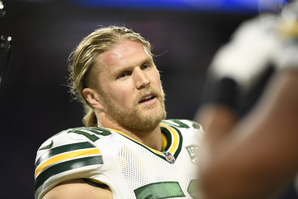 clay matthews looks onto the field during a game