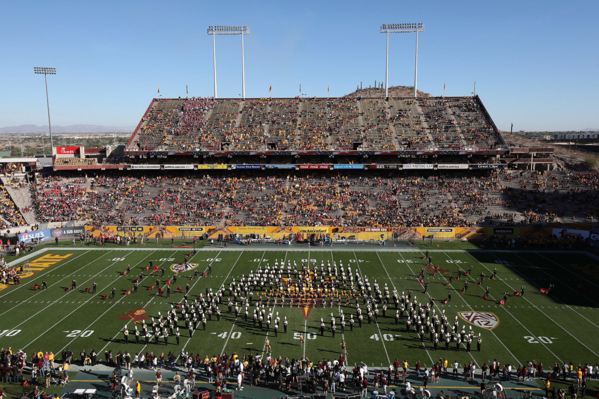 The Arizona State Sun Devils marching band performs before the college football game against the Arizona Wildcats at Sun Devil Stadium.