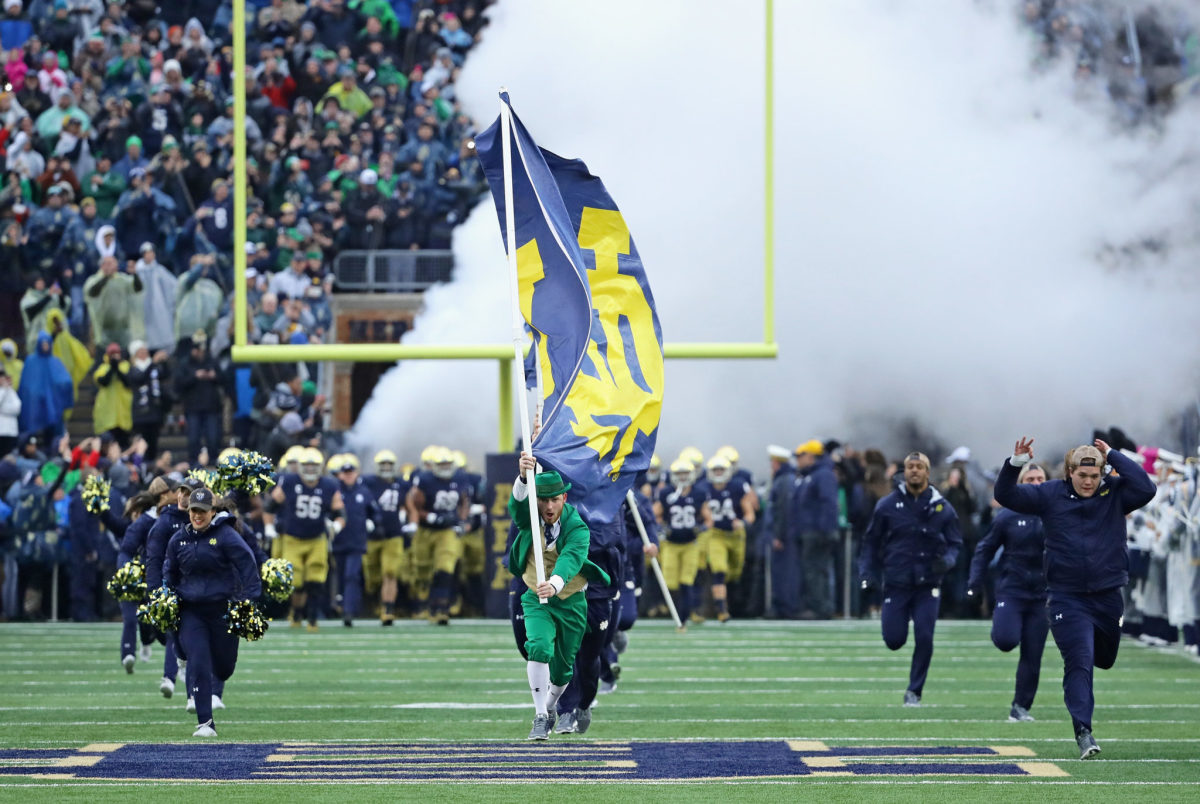 Notre Dame runs onto the field ahead of a game vs. Wake Forest.