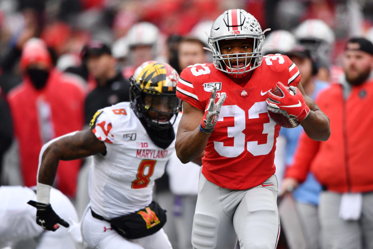 Master Teague III runs for Ohio State against Maryland.