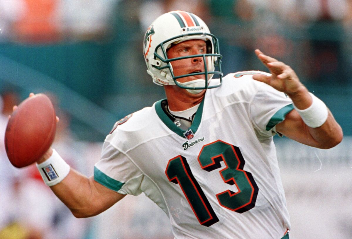 Former Miami Dolphins quarterback Dan Marino completes a pass.