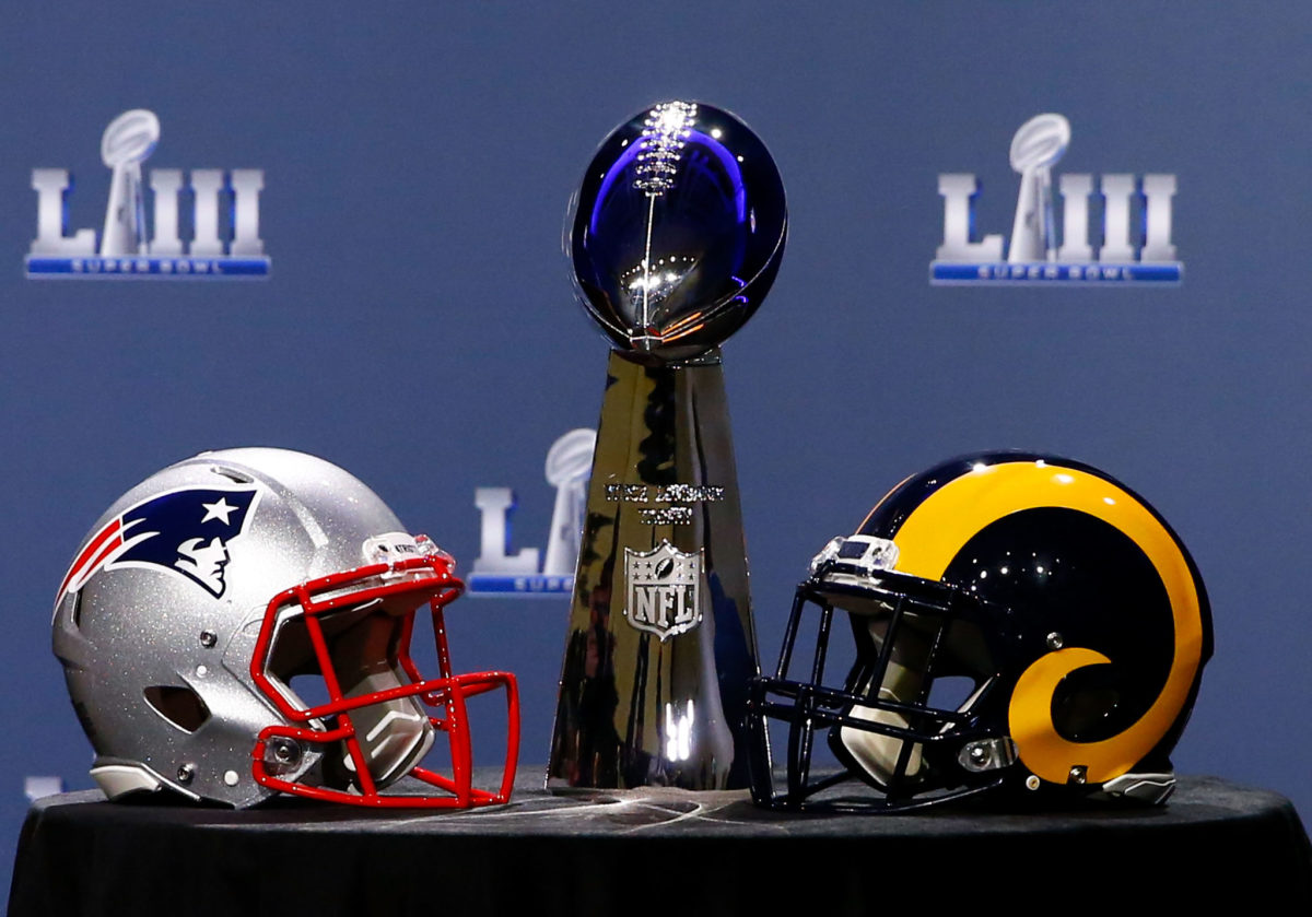 ATLANTA, GA - JANUARY 30:  Detail of the Lombardi Trophy and the helmets of the New England Patriots (left) and the Los Angeles Rams priot to NFL Commissioner Roger Goodell speaking during a press conference during Super Bowl LIII Week at the NFL Media Center inside the Georgia World Congress Center on January 30, 2019 in Atlanta, Georgia.  (Photo by Mike Zarrilli/Getty Images)