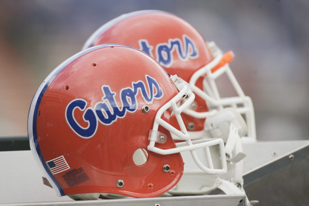 A closeup of two Florida Gators football helmets.