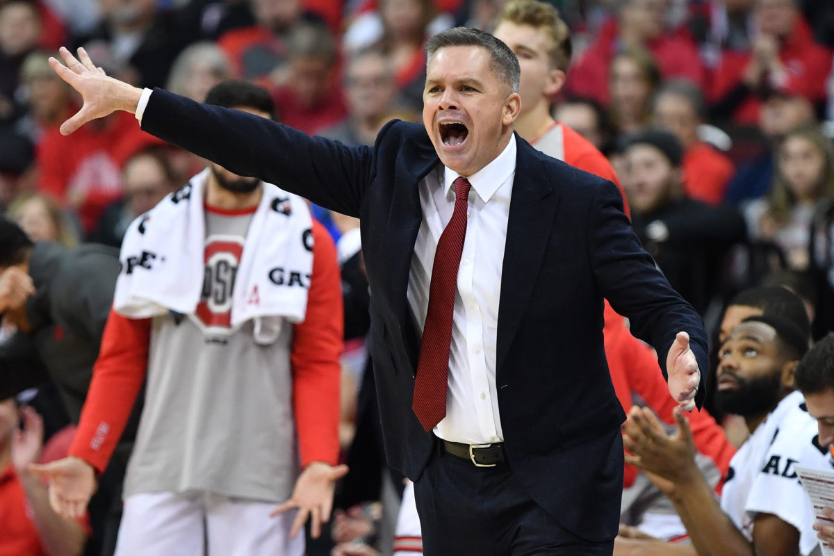 A closeup of Ohio State basketball coach Chris Holtmann yelling during a game.