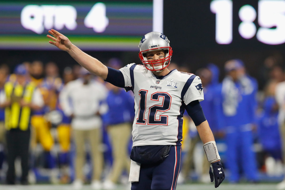 New England Patriots QB Tom Brady reacting during a football game.