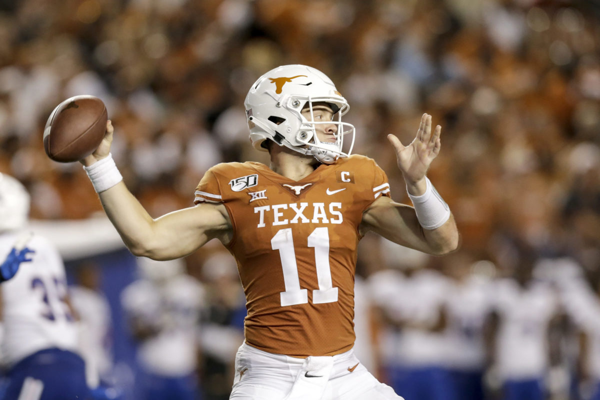 Sam Ehlinger throws a pass for the Texas Longhorns.