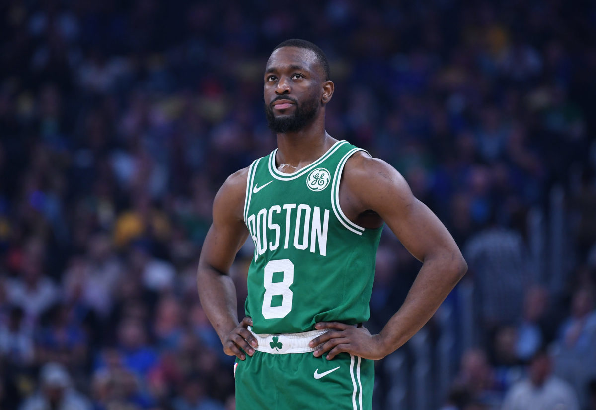Kemba Walker stands on the court during a game for the Boston Celtics.